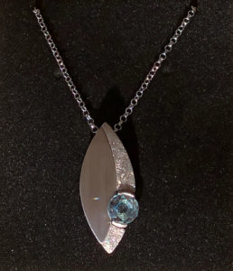 Silver pendant, donated by McCutchen Jewelers